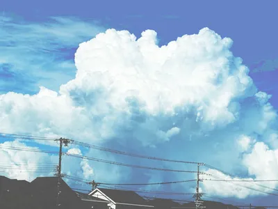 晴れ渡る空と入道雲の壮大な景色